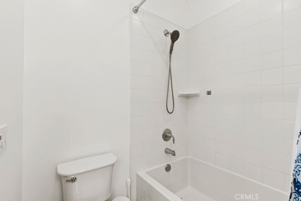120 Gemstone Irvine, CA 92620 - Photo 21 of 43 a bathroom with a bath tub and a shower