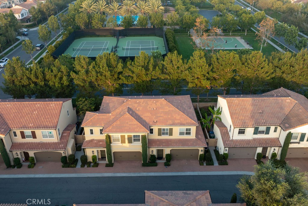 120 Gemstone Irvine, CA 92620 - Photo 29 of 43 an aerial view of multiple houses with a yard