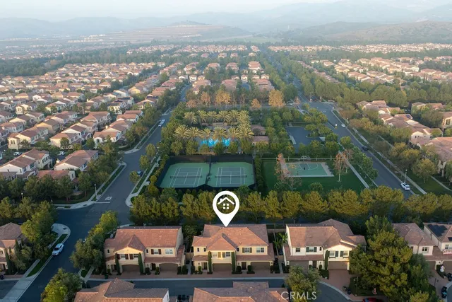 an aerial view of a city with lots of residential buildings