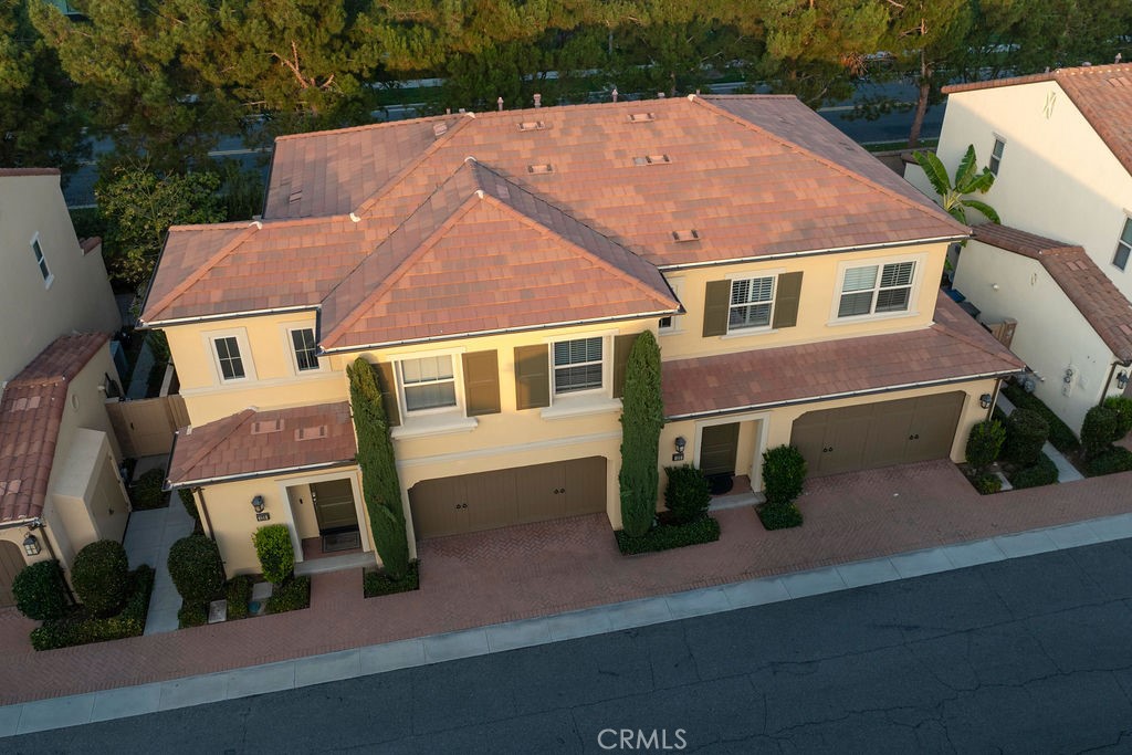 120 Gemstone Irvine, CA 92620 - Photo 38 of 43 an aerial view of residential houses with street