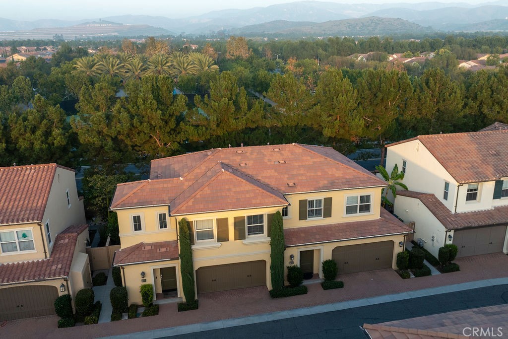 120 Gemstone Irvine, CA 92620 - Photo 39 of 43 an aerial view of residential houses with outdoor space and trees