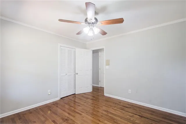 a bathroom with a granite countertop sink and a bathtub