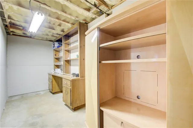 a bathroom with a shower and a sink