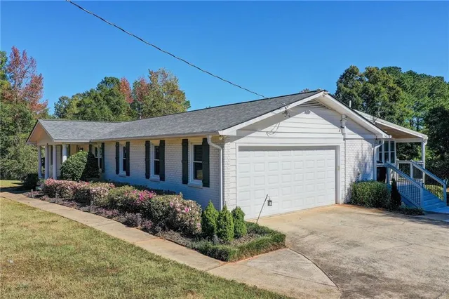$625,600 | 3415 Trickum Road, Woodstock, GA 30188