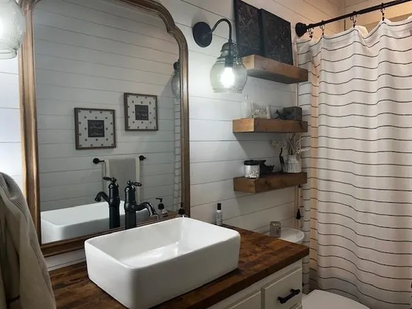 a bathroom with a sink and a bathtub