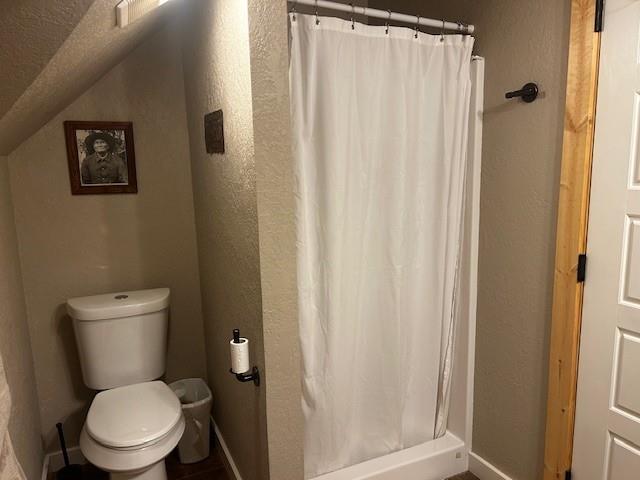 365 Mercers Preserve Road Comanche, TX 76442 - Photo 19 of 27 a white toilet sitting next to a shower