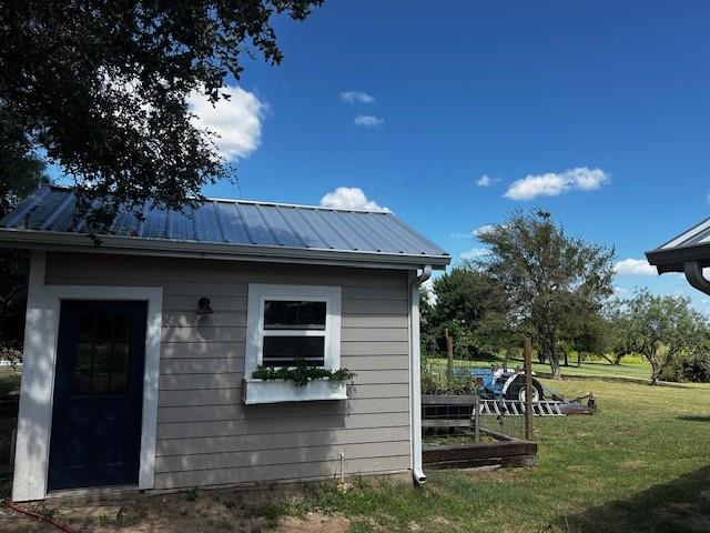 365 Mercers Preserve Road Comanche, TX 76442 - Photo 24 of 27 a backyard of a house with table and chairs