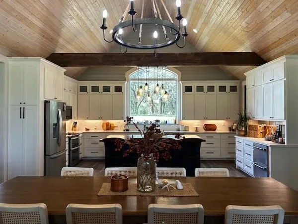 a view of a dining room with furniture