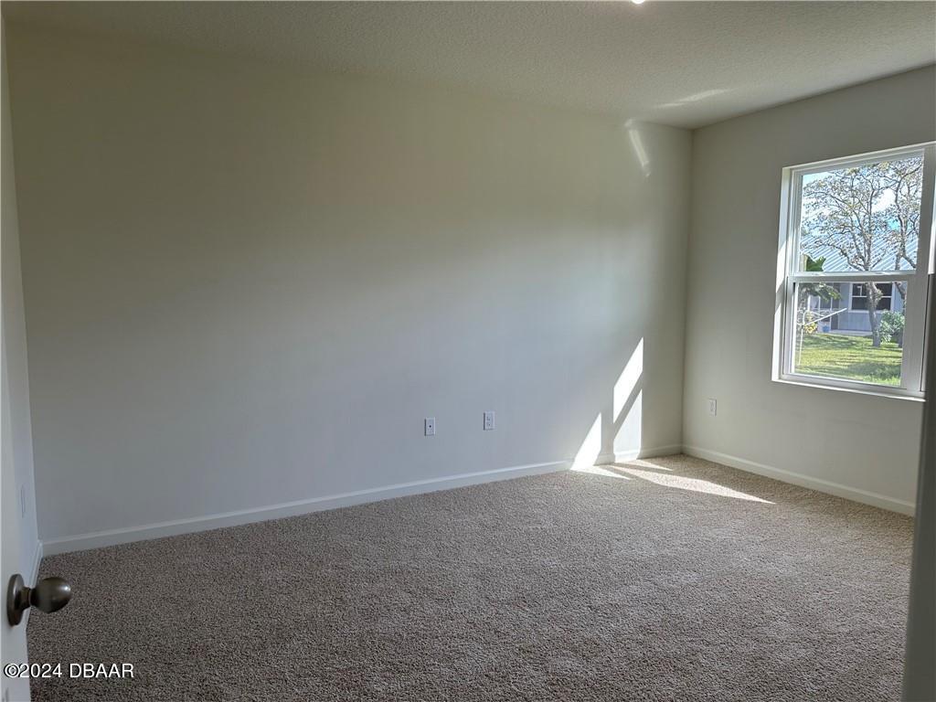 139 Empire Terrace Sebastian, FL 32958 - Photo 22 of 31 an empty room with windows