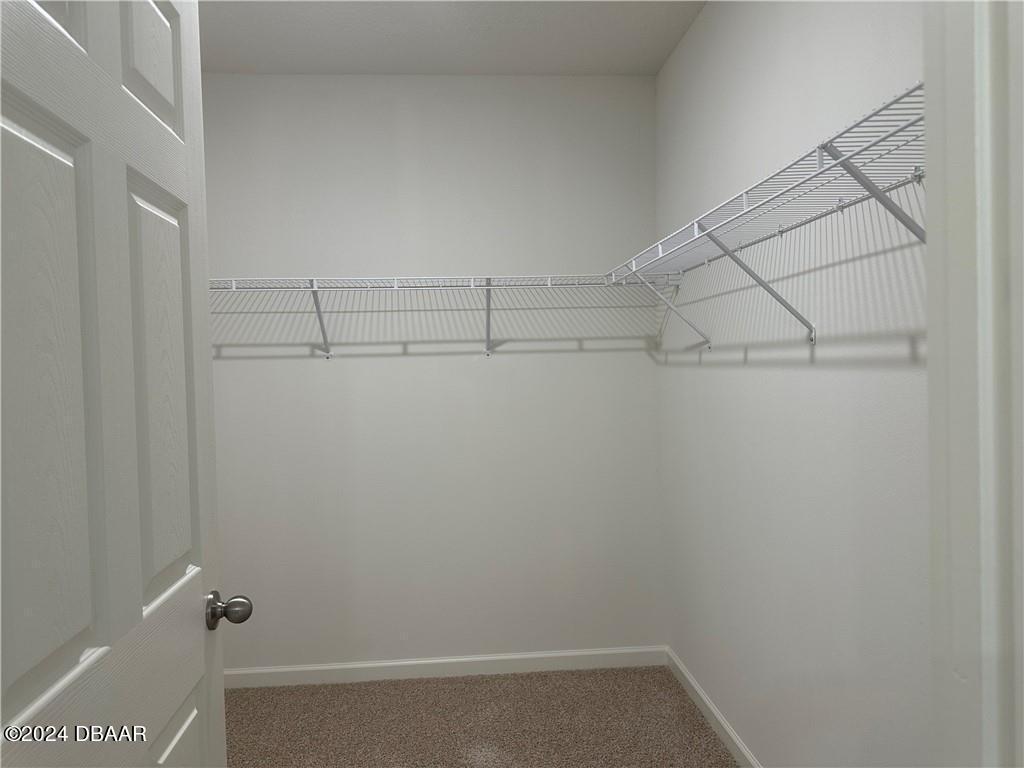 139 Empire Terrace Sebastian, FL 32958 - Photo 26 of 31 a view of a room with racks on the wall