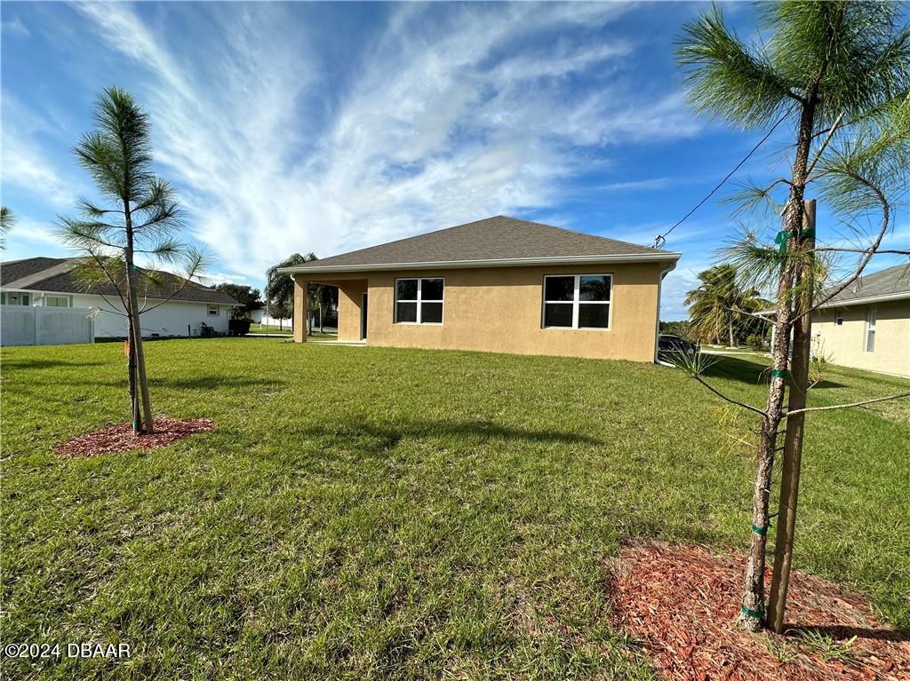 139 Empire Terrace Sebastian, FL 32958 - Photo 31 of 31 a house view with a garden space
