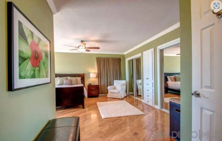 5512 Candlelight Drive La Jolla, CA 92037 - Photo 17 of 23 a living room with furniture and a painting on the wall