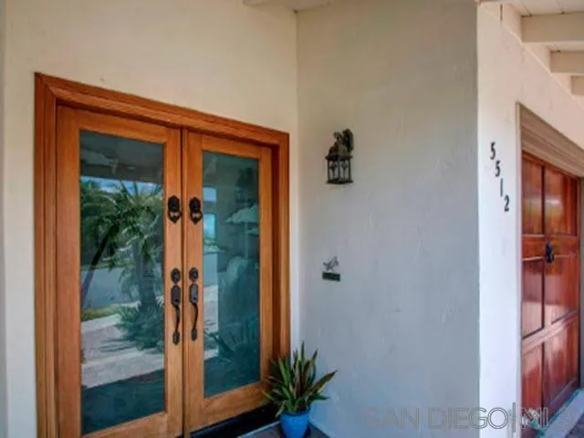 5512 Candlelight Drive La Jolla, CA 92037 - Photo 2 of 23 a view of a entryway door