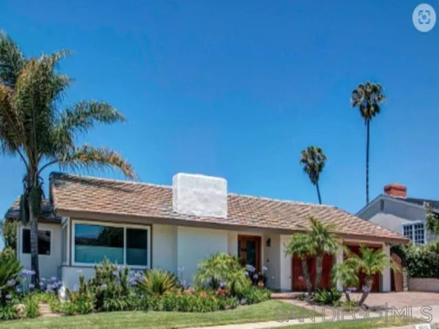 5512 Candlelight Drive La Jolla, CA 92037 - Photo 3 of 23 a front view of a house with garden