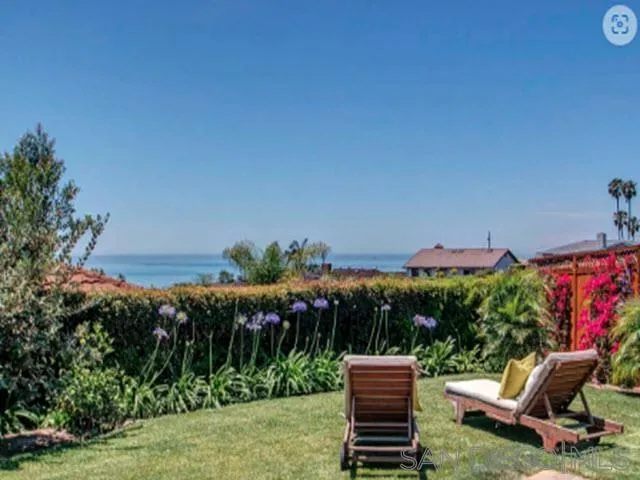 5512 Candlelight Drive La Jolla, CA 92037 - Photo 7 of 23 a view of a chairs and table in the backyard