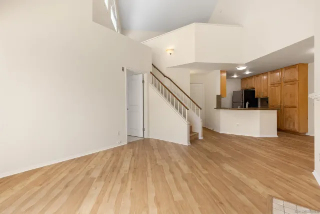 a dining room with table chairs and chandelier