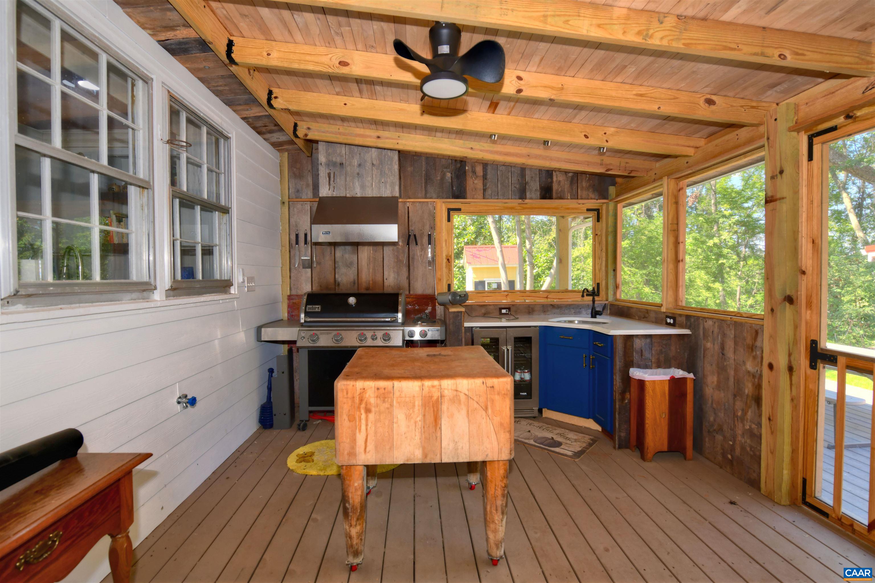 879 Evans Mill Road Dillwyn, VA 23936 - Photo 30 of 43 a kitchen with a sink and wooden floor