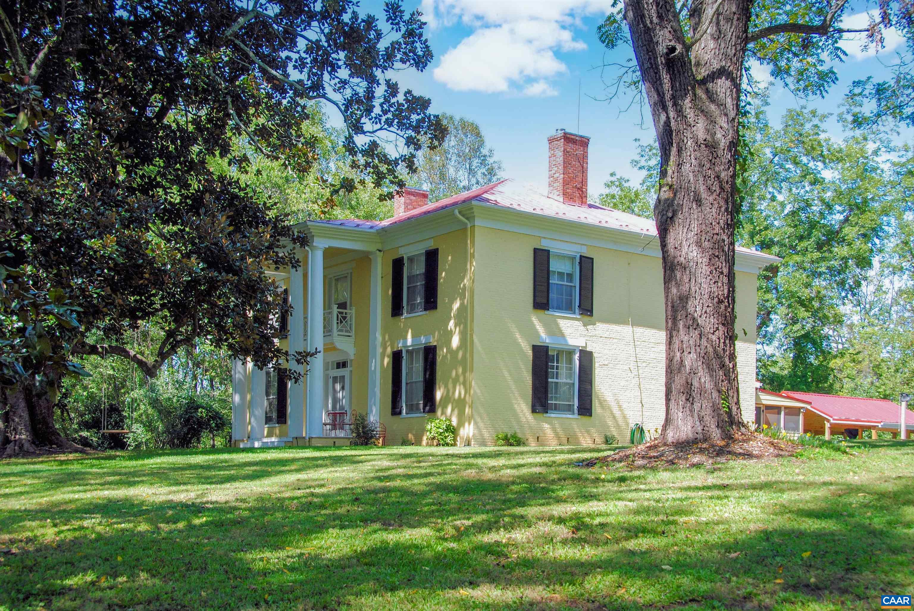 879 Evans Mill Road Dillwyn, VA 23936 - Photo 7 of 43 a front view of a house with a garden