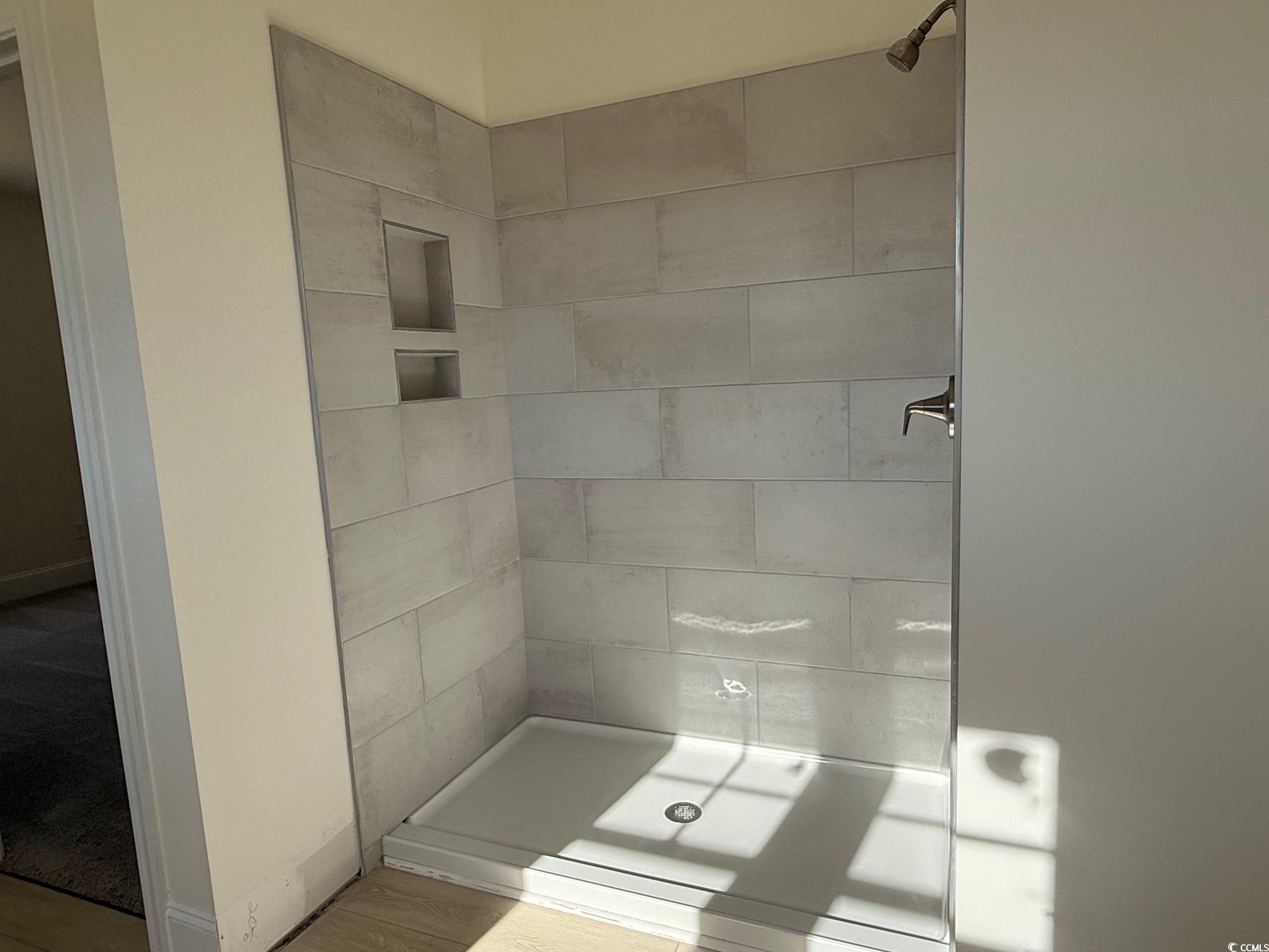 209 Blue Wing Court Conway, SC 29527 - Photo 7 of 15 Owner's bath with divided double vanity, tile shower & soaking tub.