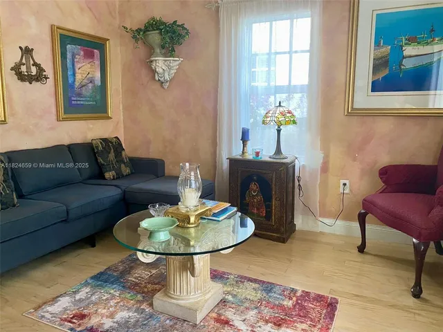 a living room with furniture and a couch