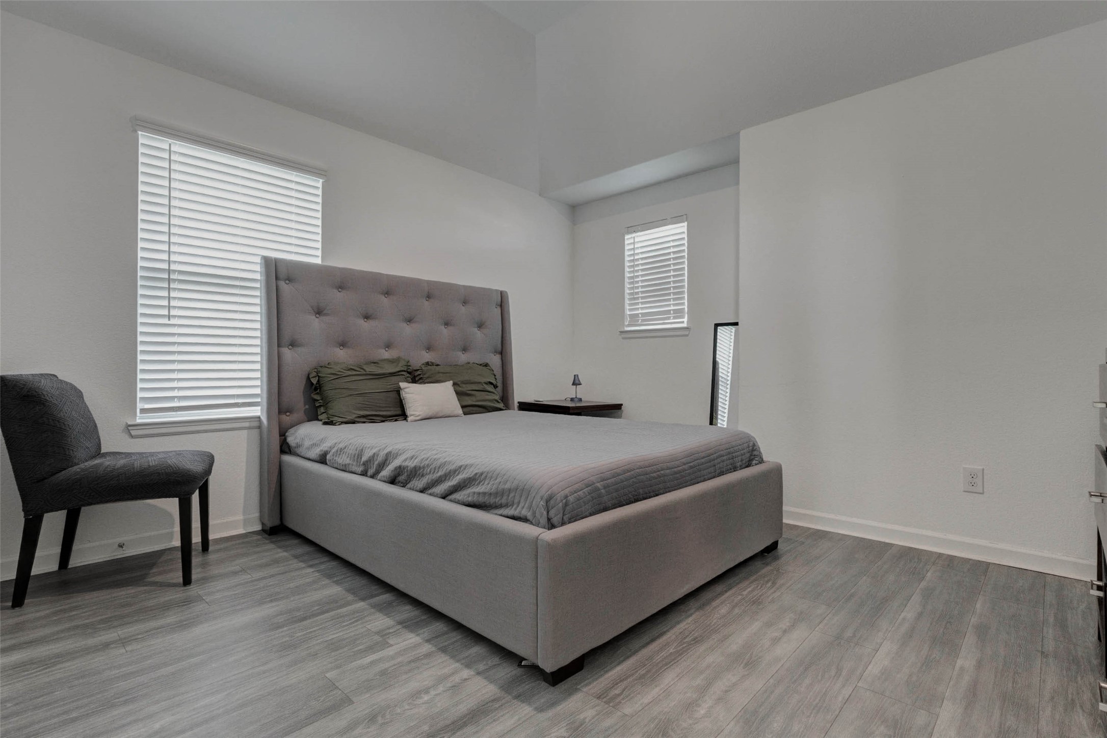 3711 Castle Rock Drive Rosenberg, TX 77469 - Photo 41 of 46 a bedroom with a bed and a chair