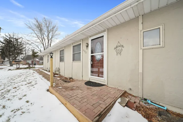 a view of a backyard of snow