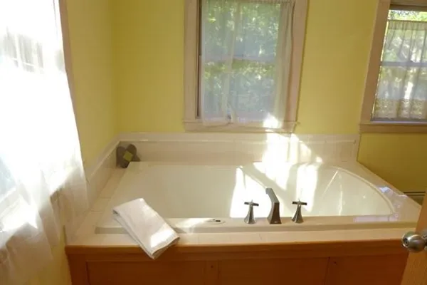 a view of bathroom with a bathtub