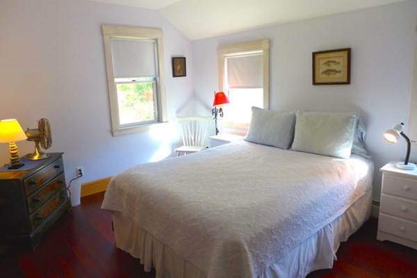 267 Great Plains Road West Tisbury, MA 02568 - Photo 23 of 34 a bedroom with a bed and a window