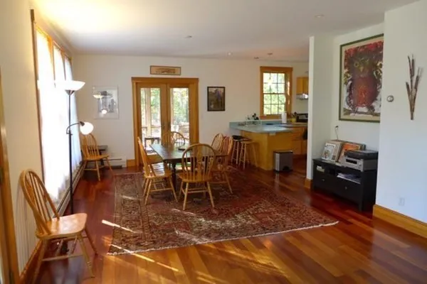 a view of a dining room with furniture
