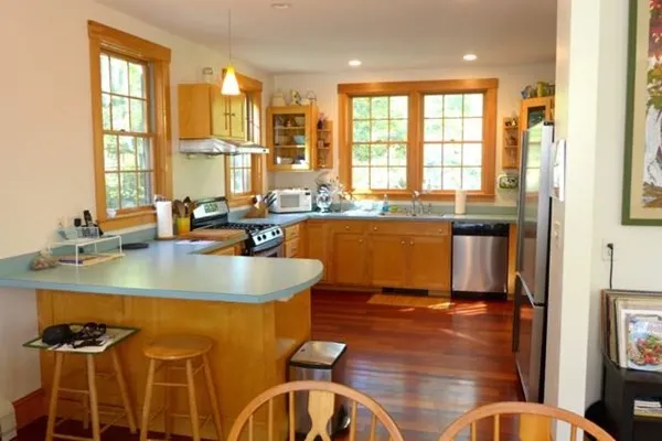 a dining table with chair and window