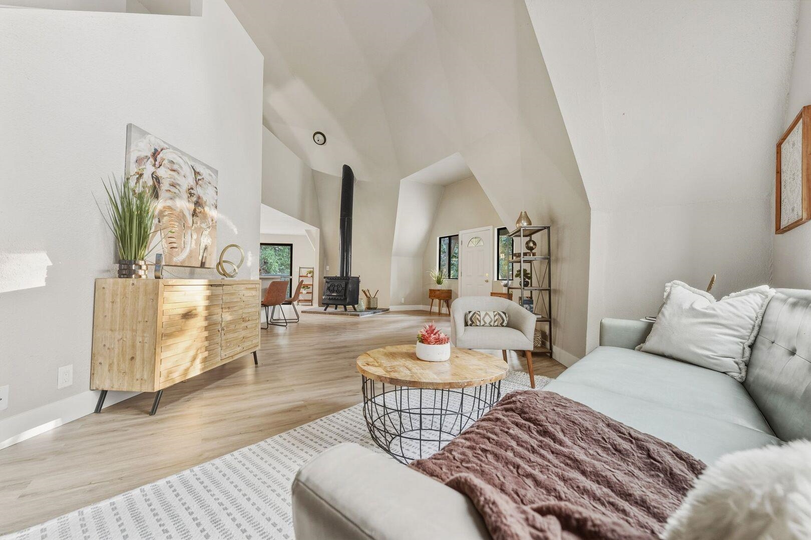 5841 Fallen Oak Drive Pollock Pines, CA 95726 - Photo 12 of 44 a living room with furniture and a chandelier