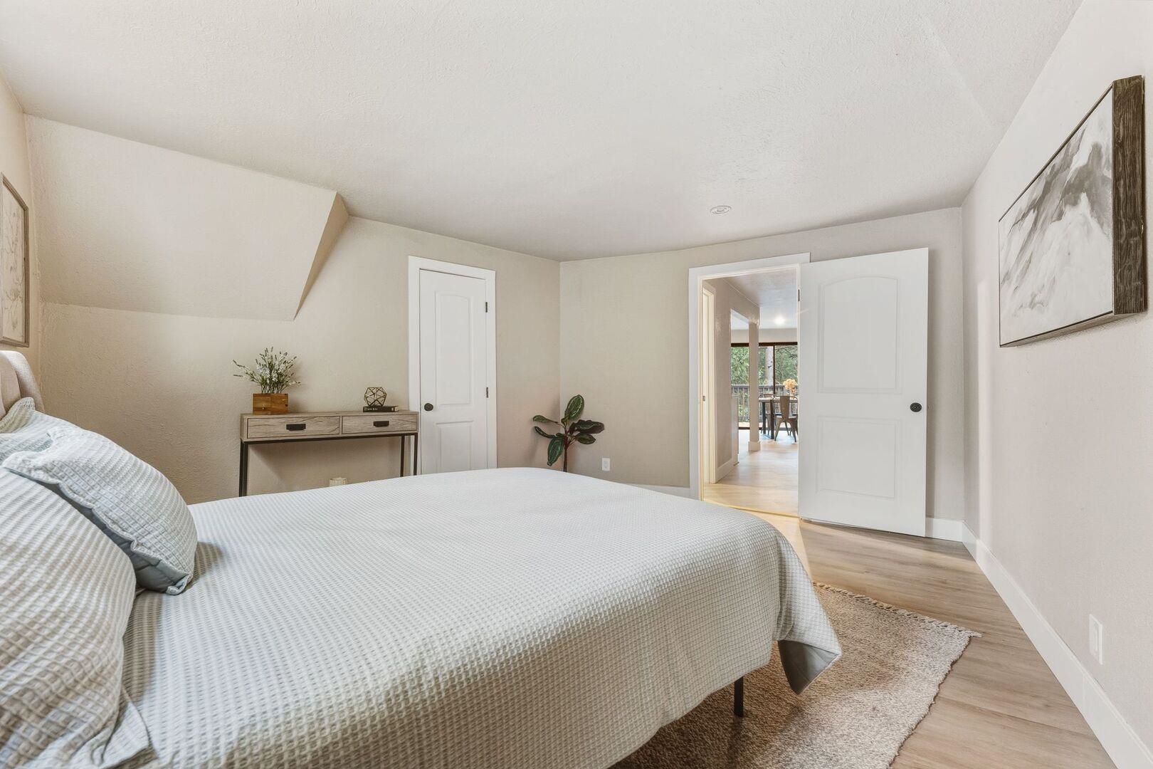 5841 Fallen Oak Drive Pollock Pines, CA 95726 - Photo 26 of 44 a bedroom with a bed and a large mirror