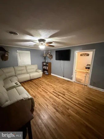 a bedroom with bed and window
