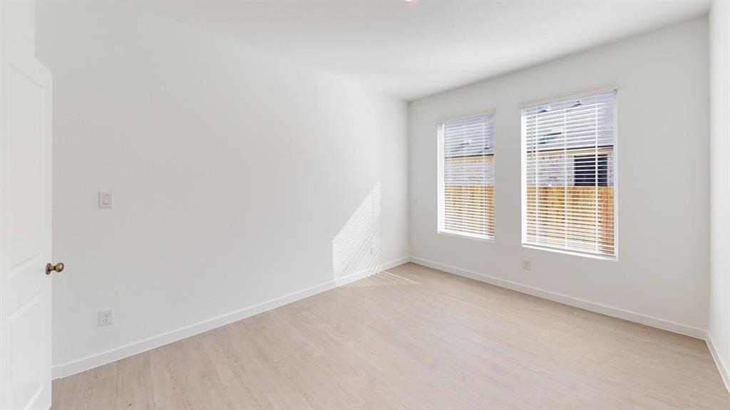 454 Ridge Drive Justin, TX 76247 - Photo 15 of 24 a view of an empty room with a window