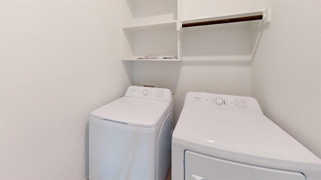 454 Ridge Drive Justin, TX 76247 - Photo 21 of 24 a utility room with dryer and washer
