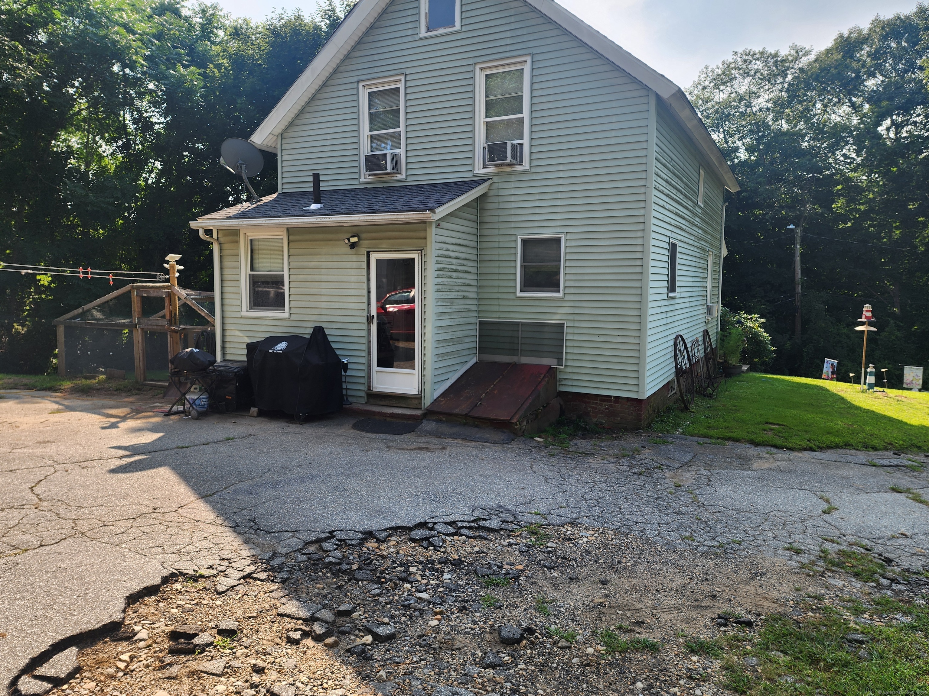 5 Avery St Extension Norwich, CT 06360 - Photo 5 of 17 a view of a house with a yard