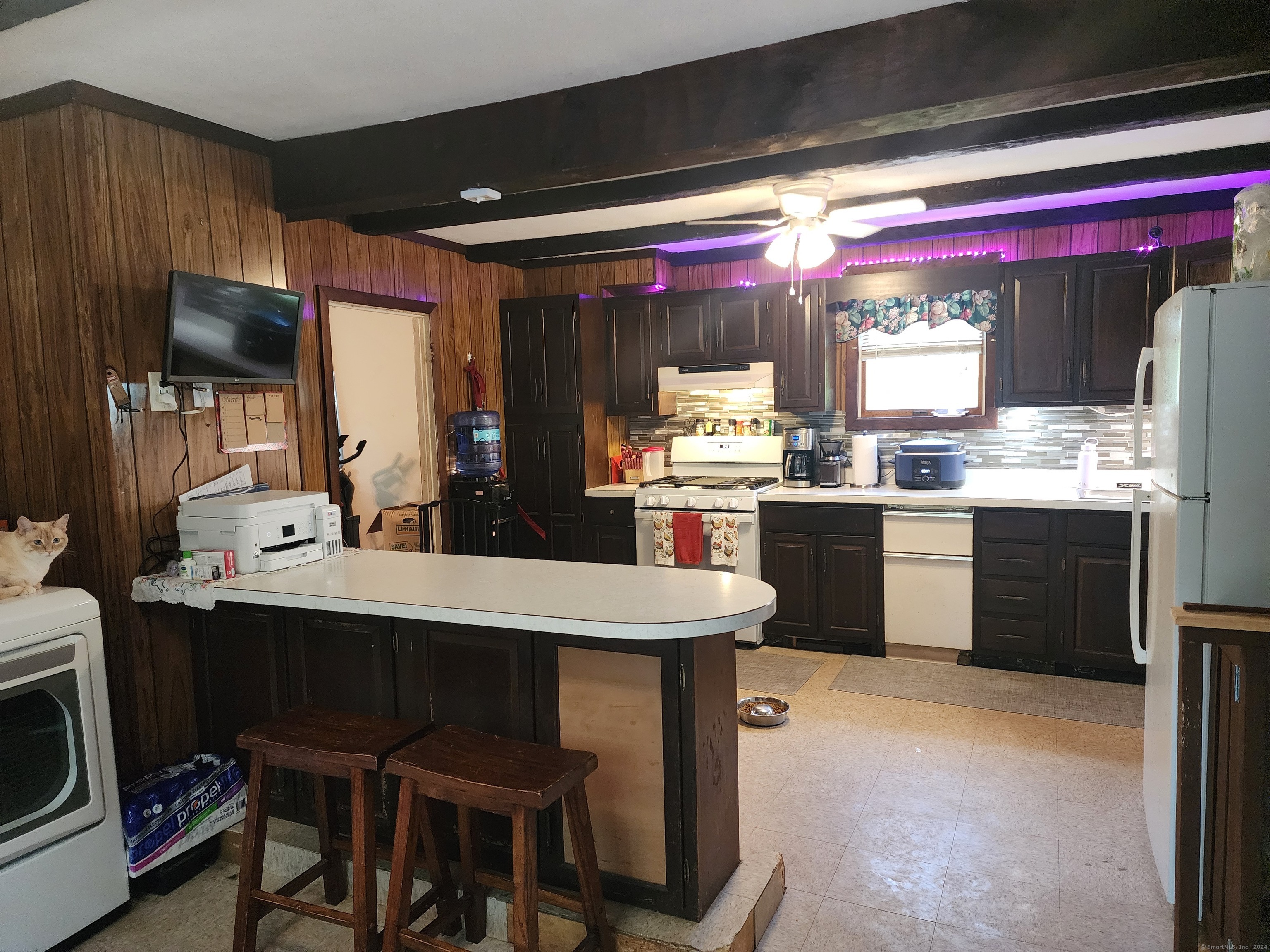 5 Avery St Extension Norwich, CT 06360 - Photo 6 of 17 a kitchen with a stove a sink dishwasher and a refrigerator