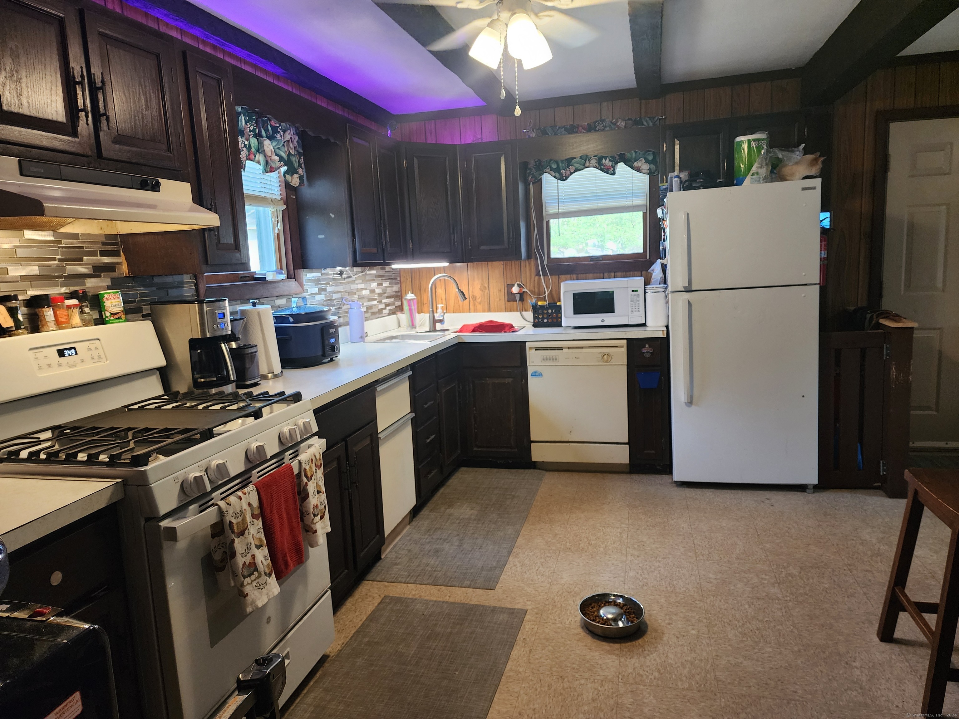 5 Avery St Extension Norwich, CT 06360 - Photo 8 of 17 a kitchen with stainless steel appliances granite countertop a refrigerator a stove and a sink