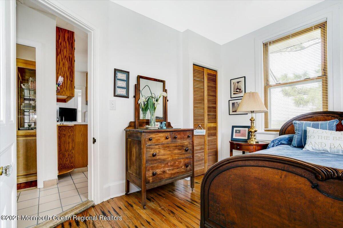 15 Riverview Road Monmouth Beach, NJ 07750 - Photo 27 of 38 a bedroom with a bed and a dresser