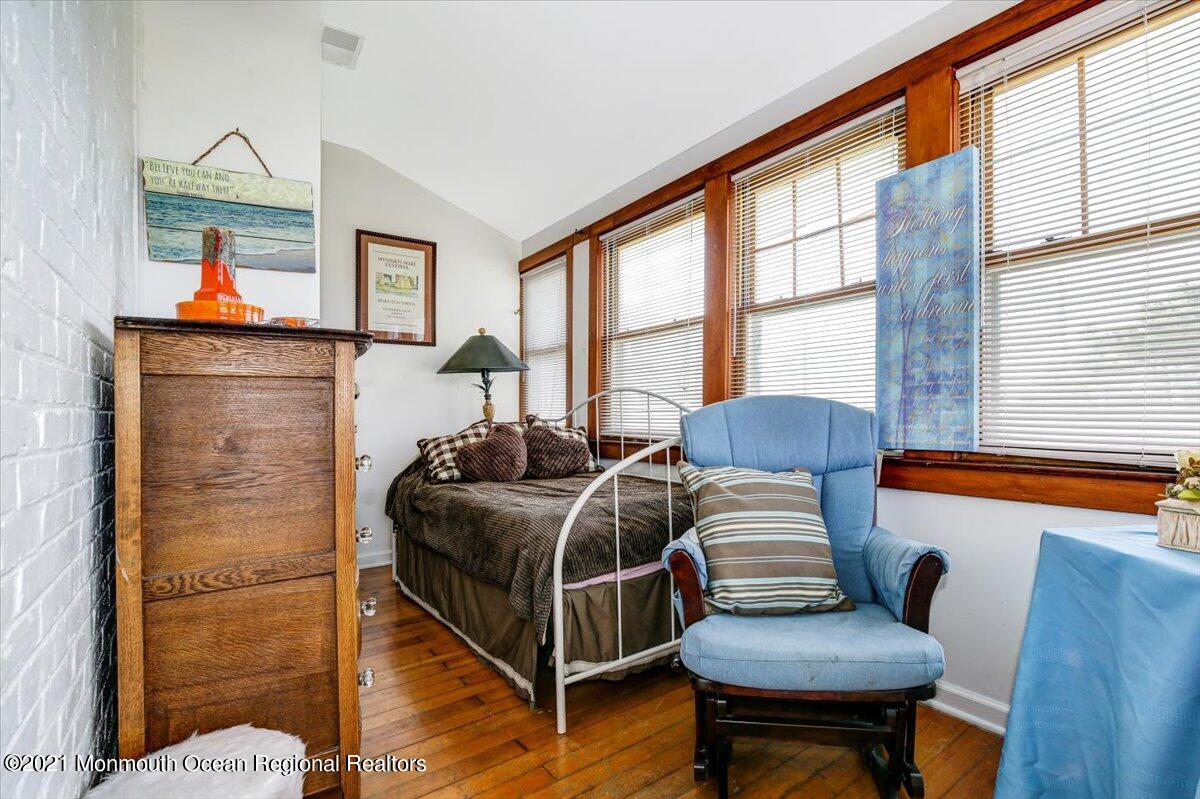 15 Riverview Road Monmouth Beach, NJ 07750 - Photo 29 of 38 a bedroom with furniture and a window
