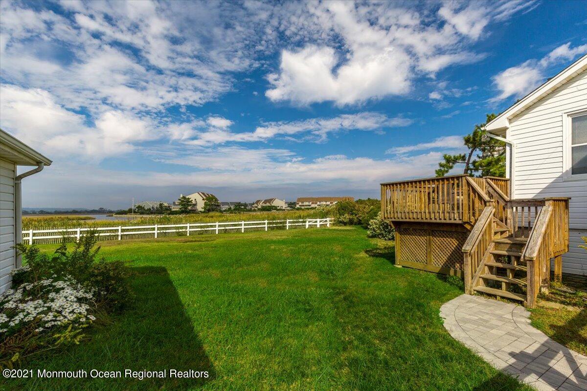 15 Riverview Road Monmouth Beach, NJ 07750 - Photo 10 of 38 a view of a backyard with sitting area