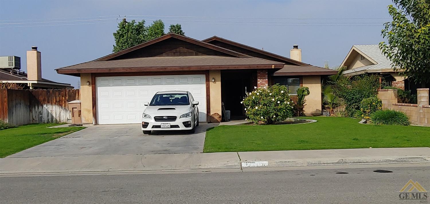 4020 Maize Court Bakersfield, CA 93313 - Photo 1 of 1 a car parked in front of a house