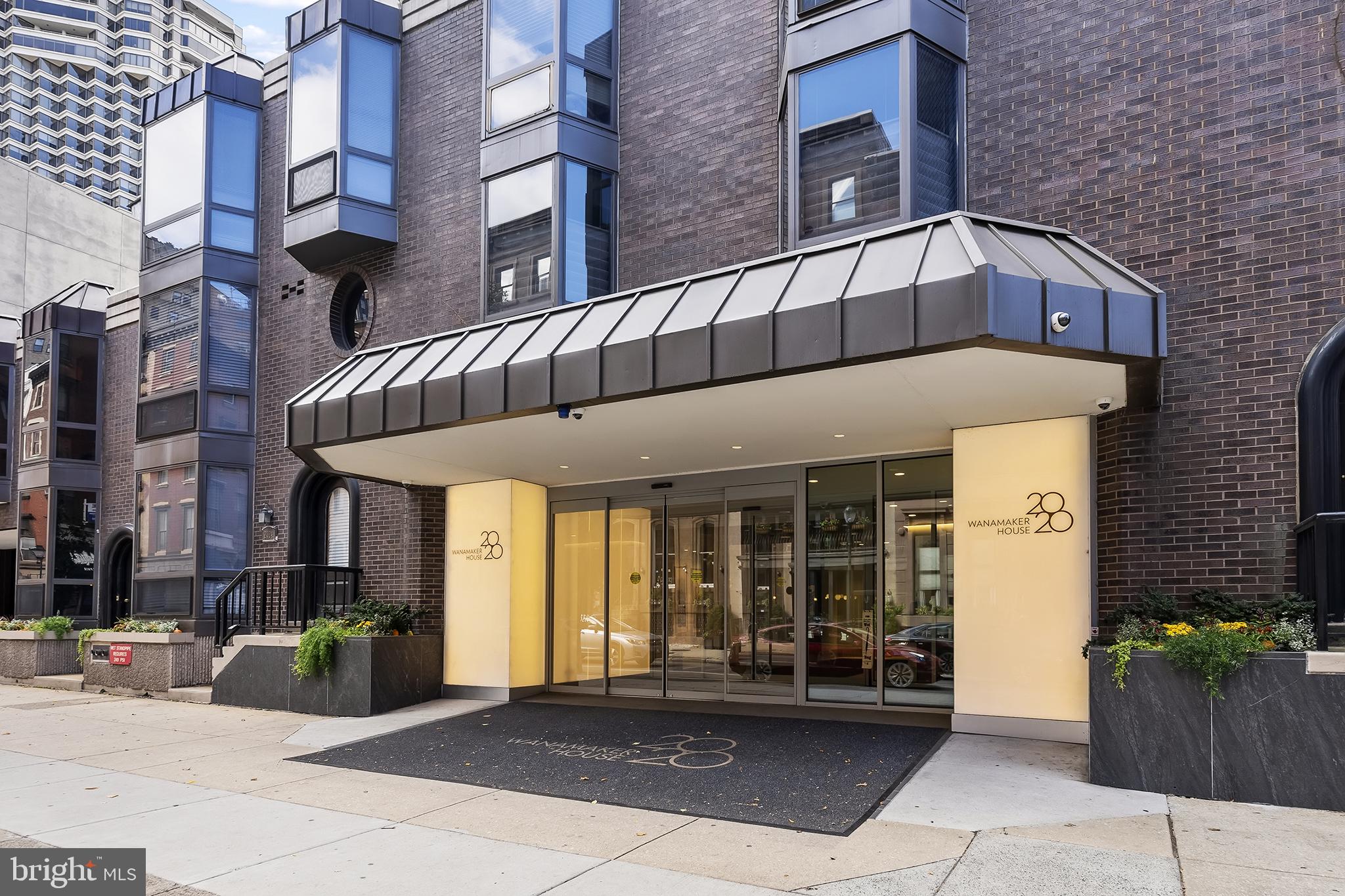 Modern elegance at urban entrance.
