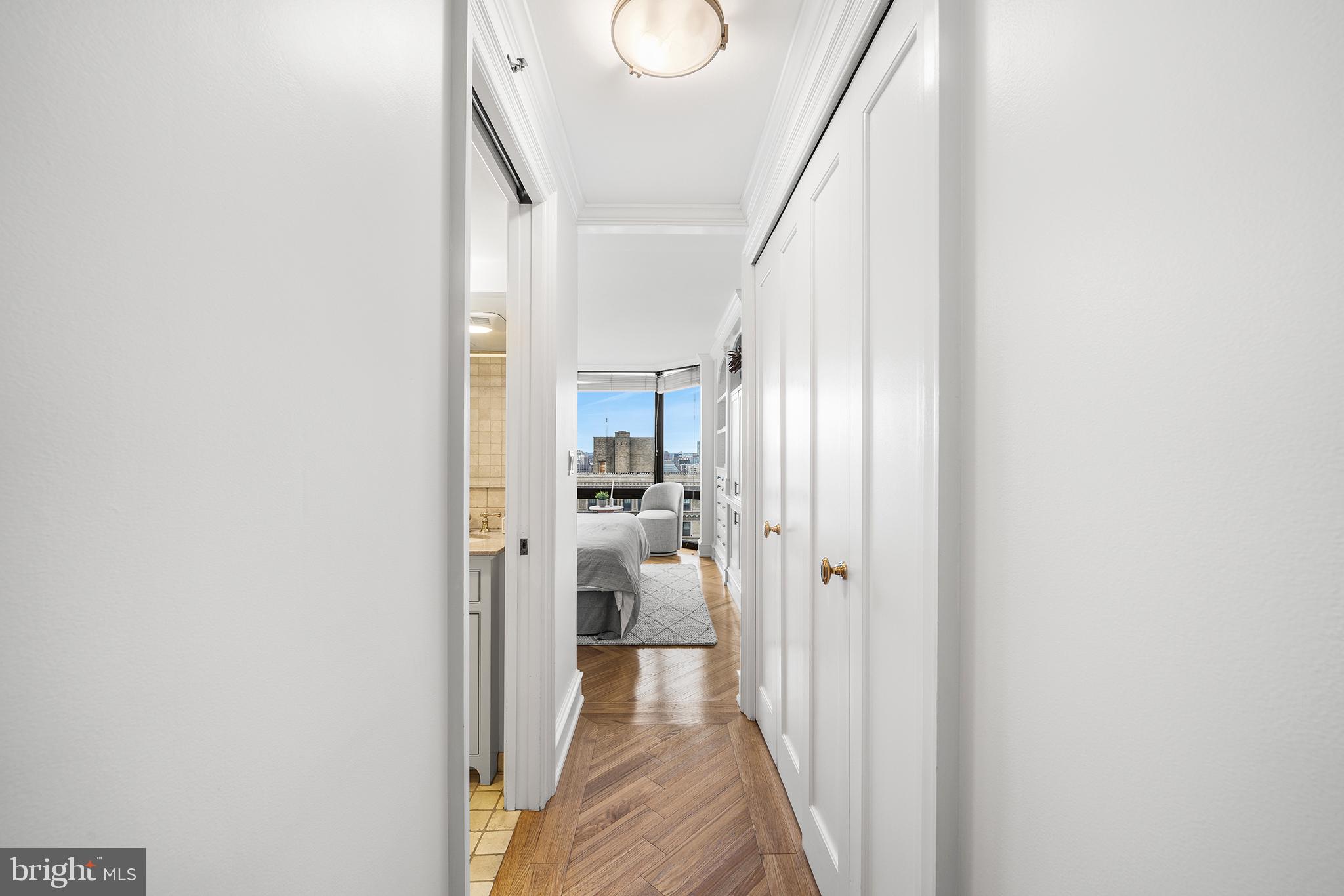 2018 Walnut Street, Unit 21L Philadelphia, PA 19103 - Photo 26 of 39 Bright hallway with city views ahead.