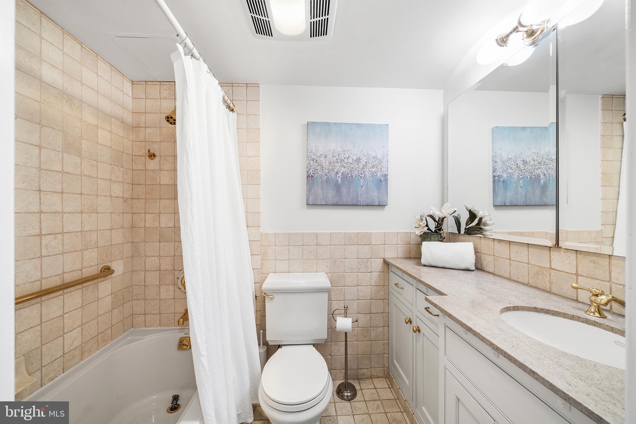 2018 Walnut Street, Unit 21L Philadelphia, PA 19103 - Photo 30 of 39 Serene bathroom with elegant finishes.