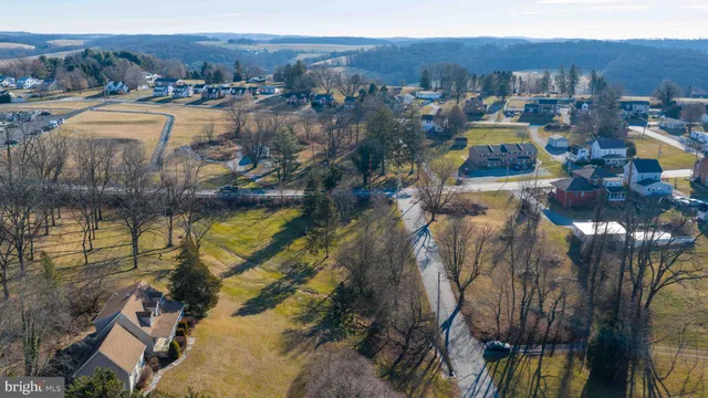 a view of a city with mountains in the background