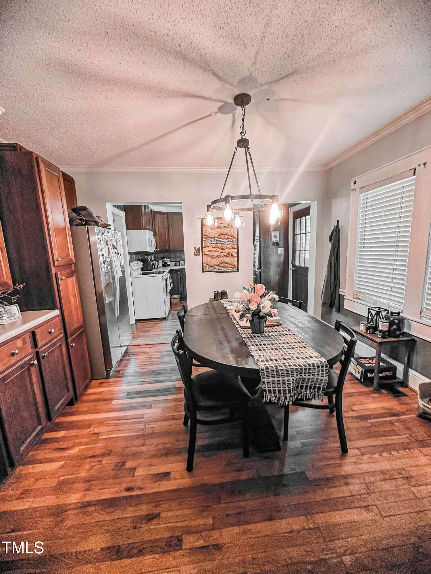 8683 Highway 15 Bullock, NC 27507 - Photo 16 of 36 a view of a dining room with furniture