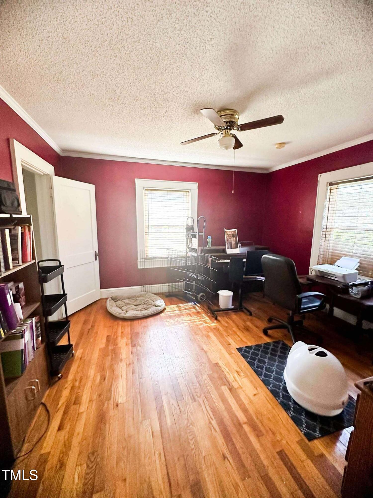 8683 Highway 15 Bullock, NC 27507 - Photo 19 of 36 a workspace with wooden floor