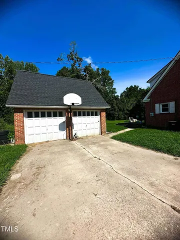 a house view with a garden space