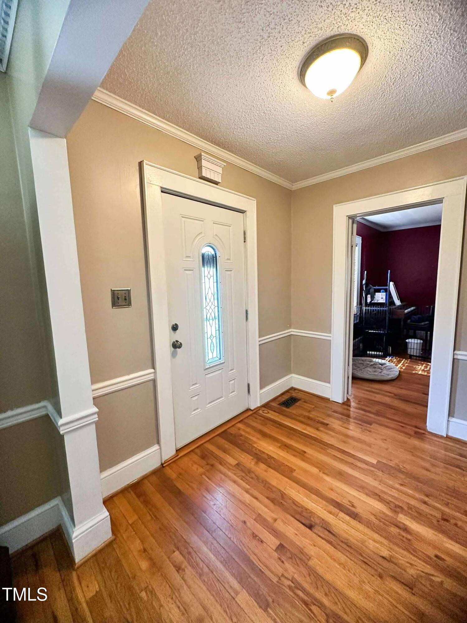 8683 Highway 15 Bullock, NC 27507 - Photo 10 of 36 a view of empty room with wooden floor
